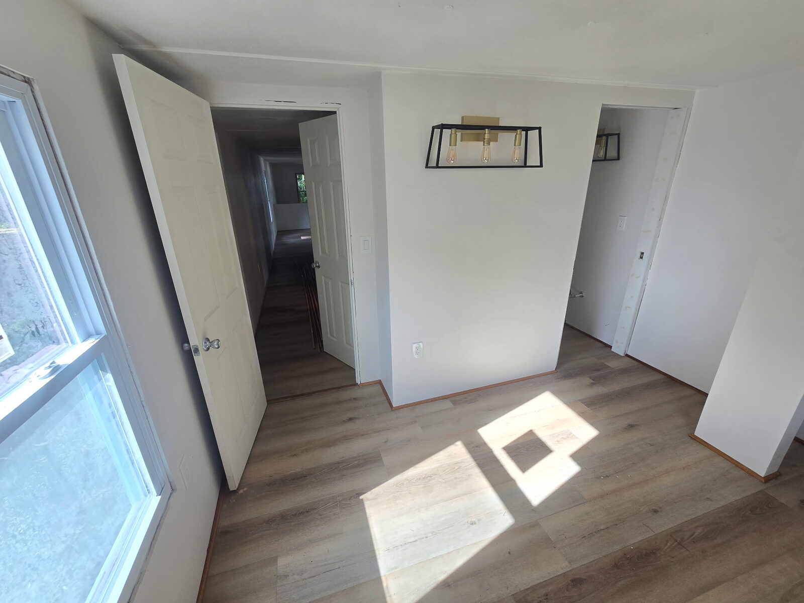 Bright interior remodel with new vinyl plank flooring and fresh paint